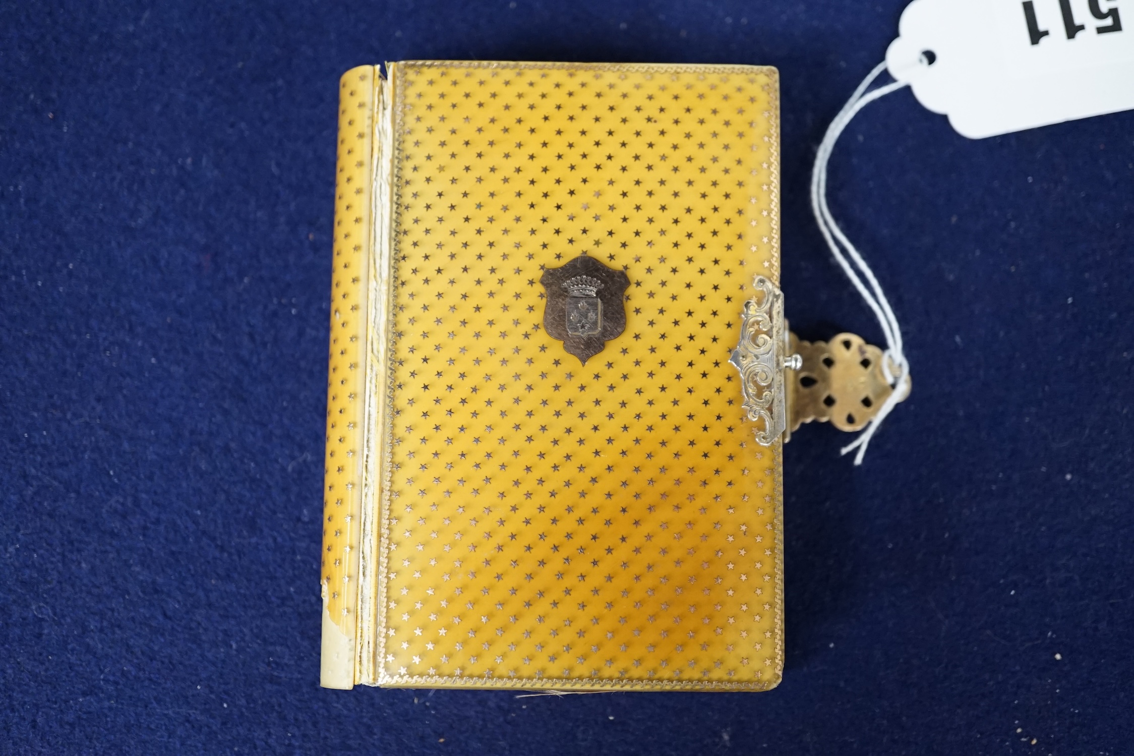 A tortoiseshell pique mounted French book, 11.5cm. Condition - poor